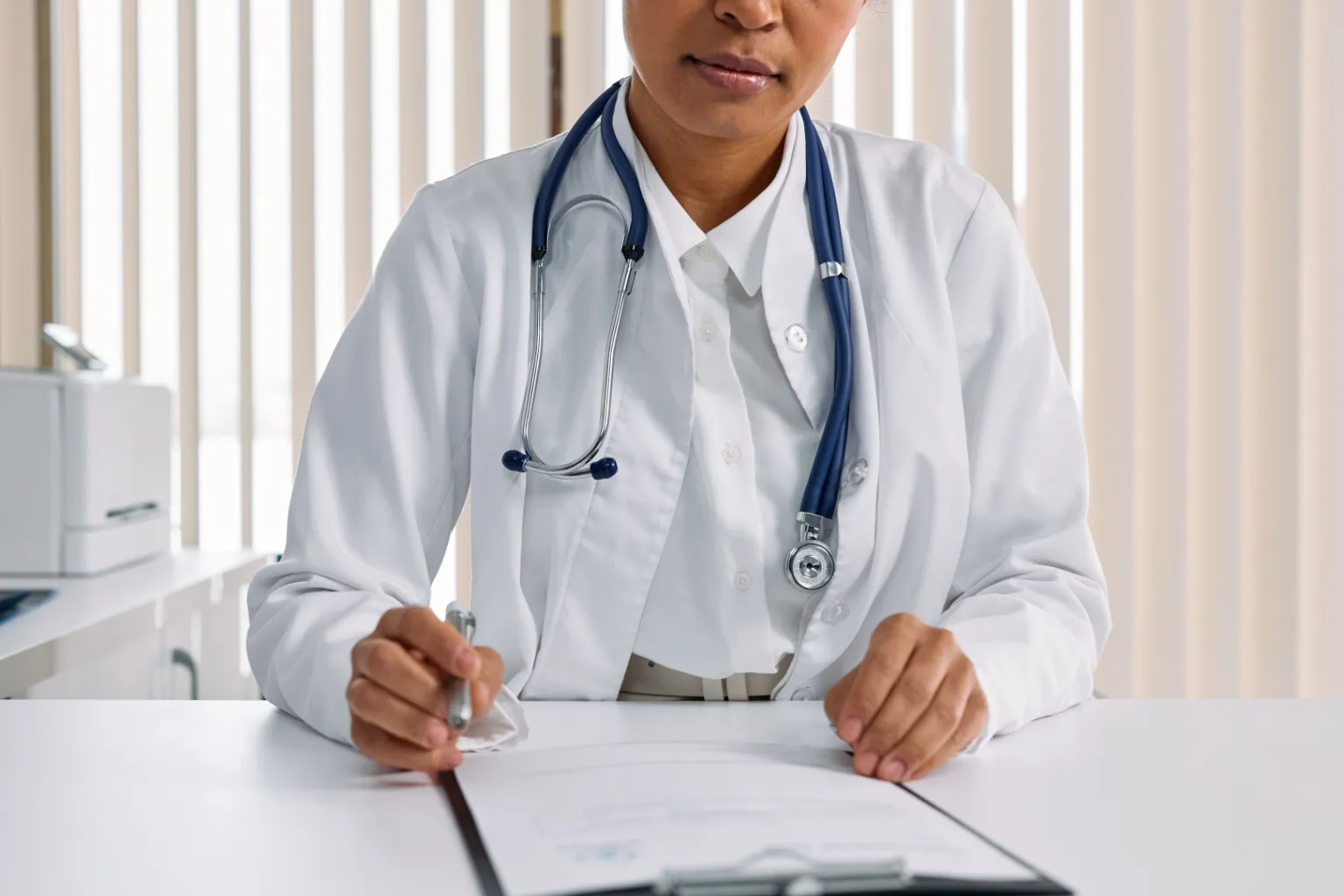 Specialist doctor consulting with a patient